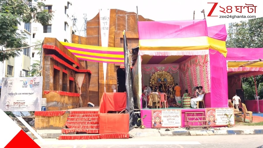 এক মণ্ডপ, দুই পুজো: মাঝখানে কালো পর্দা, নিউটাউনে উৎসবের মাঝেও বিষাদের সুর!